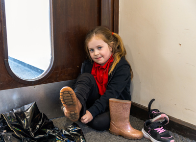 Putting on own shoes and coats